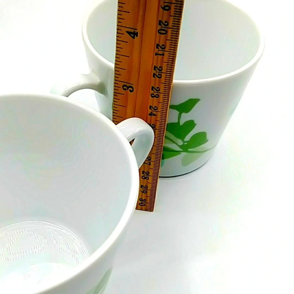 2 IKEA Stilenlig White Mugs With Ginko Leaves.